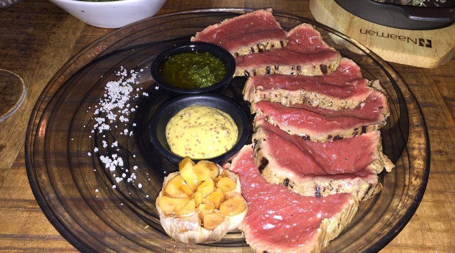 steak which you finish to your taste on a hot stone