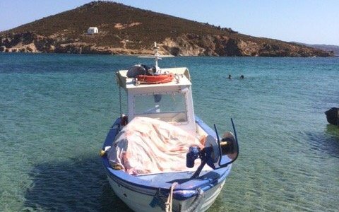 The Taverna and the beach where you may swim across the island