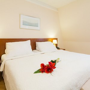 Hotel Palatin in Karlovy Vary, image may contain: Cushion, Corner, Furniture, Bed