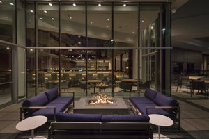 Hilton Boston / Woburn in Woburn, image may contain: Couch, Indoors, Lighting, Living Room