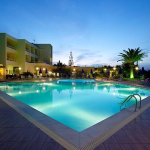 Enjoy your drink in the pool area gazing the sea view