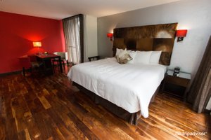 La Inmaculada Hotel in Guatemala City, image may contain: Flooring, Floor, Wood, Hardwood