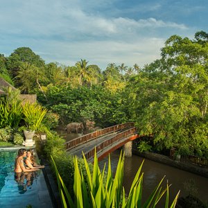 Sanctoo Suites & Villas in Singapadu, image may contain: Resort, Hotel, Villa, Backyard