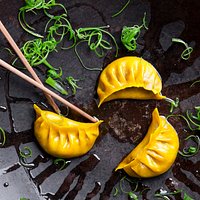 Duck Gyoza - wok gyoza, hazelnut, steam & chili, cucumber, goem sesame, yakitori