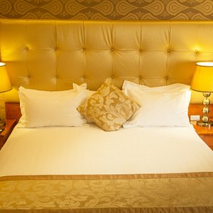 Jupiter International Hotel Bole in Addis Ababa, image may contain: Cushion, Home Decor, Table Lamp, Lamp