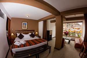 Hotel Conde de Lemos in Puno, image may contain: Hotel, Resort, Bed, Furniture