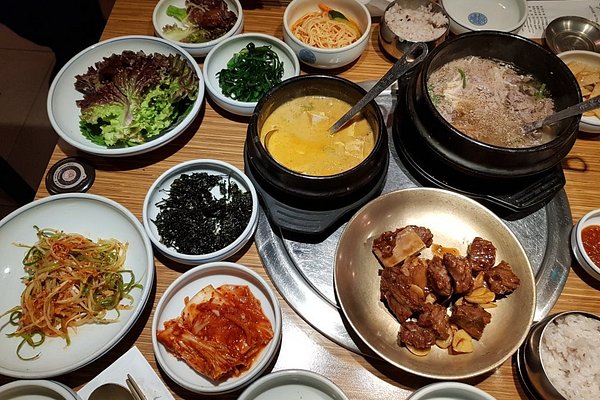 BBQ grill at our table, Amiso Korean Restaurant, Myeongdong District,  Jung-gu, Seoul. - Picture of Amiso, Seoul - Tripadvisor