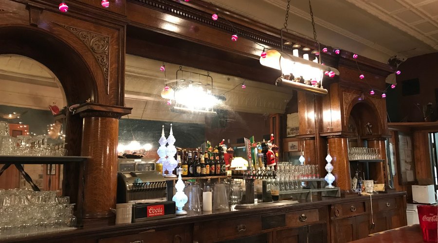 Antique bar - handmade and hand carved. Beautiful.