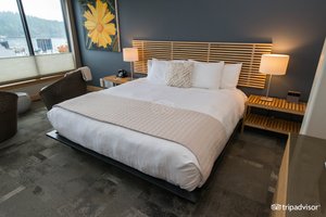 The Island Inn at 123 West in San Juan Island, image may contain: Furniture, Interior Design, Bed, Bedroom
