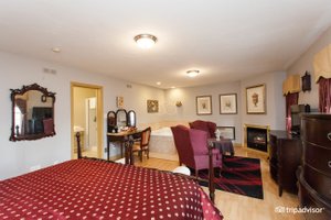 Wild Rose Inn in Moncton, image may contain: Furniture, Cabinet, Bedroom, Bed
