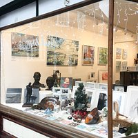 The window featuring local artists Ben Fenton, Richard Neave, Clive Dand and Daimian Barclay-Dea