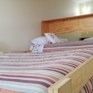 Habitación matrimonial más dos camas individuales
