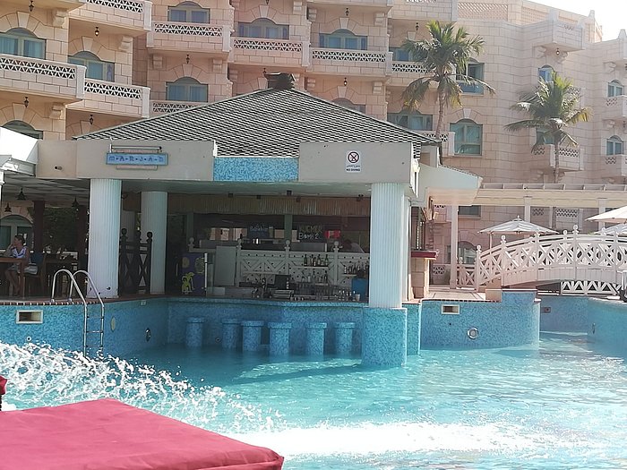 Re-filling the Hyatt pool after cleaning- Swim up bar and restaurant to the left