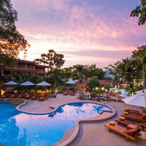 Chanalai Flora Resort, Kata Beach, Phuket in Phuket, image may contain: Hotel, Resort, Chair, Pool