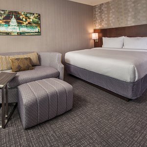 Courtyard by Marriott Washington, DC/U.S. Capitol in Washington DC, image may contain: Furniture, Couch, Bed
