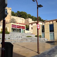 View across square towards tourist office and tunnel