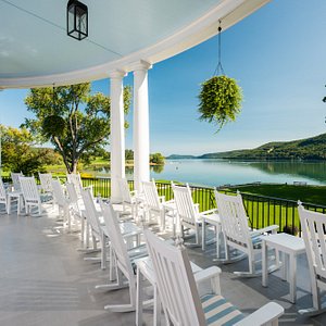 The Otesaga Resort Hotel in Cooperstown, image may contain: Scenery, Outdoors, Nature, Chair