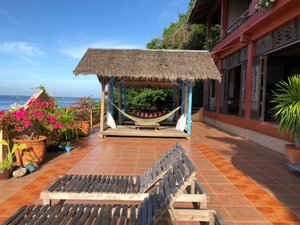 Portulano Dive Resort in Luzon, image may contain: Villa, Hotel, Resort, Plant