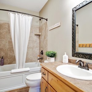 Arrowhead Lodge in West Yellowstone, image may contain: Furniture, Indoors, Bedroom, Bed