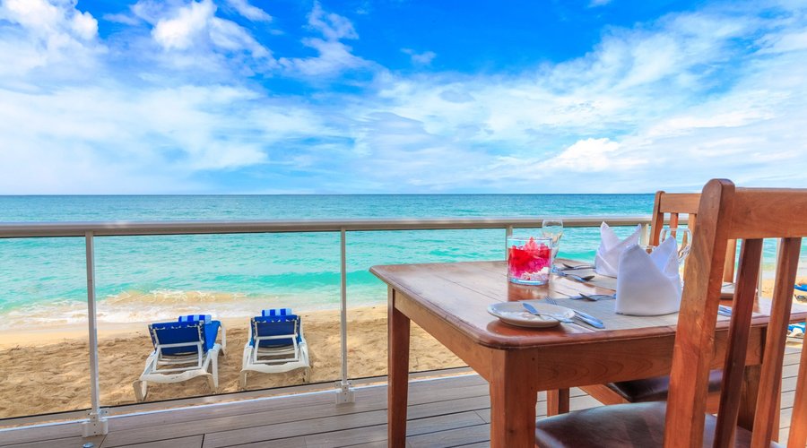 A beautiful view of the caribbean sea from our newly renovated restaurant deck on the 7 mile bea
