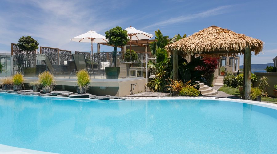 Heated swimming pool, thermal spa pool and outdoor furniture