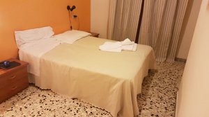 Albergo Nella in Imperia, image may contain: Bed, Furniture