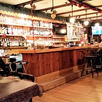 Brightly lit bar.