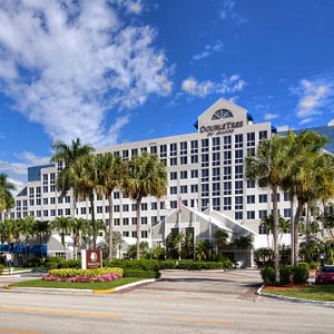DoubleTree by Hilton Hotel Deerfield Beach - Boca Raton in Deerfield Beach, image may contain: Hotel, Resort, Condo, Chair