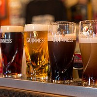 From left to right: red fruit beer, lager, Guinness and Kilkenny getting settled.