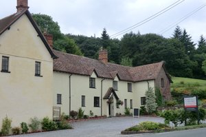 Castle of Comfort Hotel & Restaurant in Dodington, image may contain: Hotel, Cottage, Housing, House