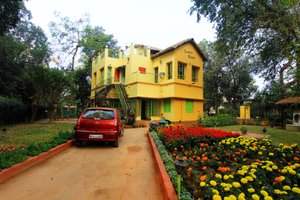 Country Roads in Santiniketan, image may contain: Resort, Hotel, Villa, Car