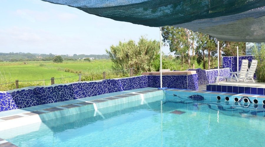 The pool with various terraces around - with a lovely view.