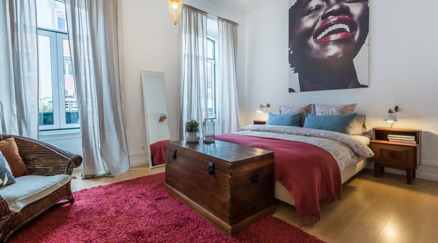 Large room with shared bathroom, street view