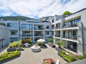 The Glebe Apartments in Queenstown, image may contain: City, Urban, Condo, Building Complex