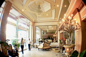 Hotel Uno in Mindanao, image may contain: Photography, Chandelier, Lamp, Indoors