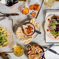 Our pork and falafel 'babs, alongside some of our sides