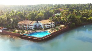 Acron Waterfront Resort in Baga, image may contain: Resort, Hotel, Building, Villa