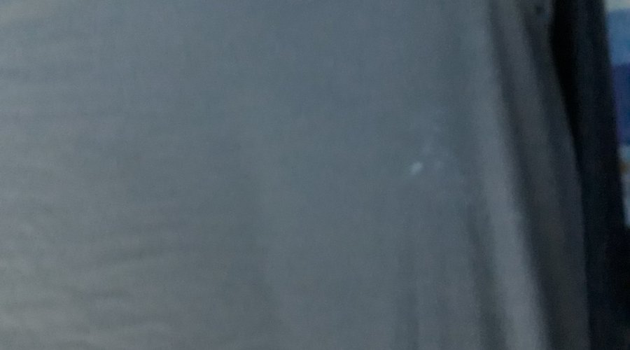 stain on sheet, hard to photograph but it looked like milk or worse...
