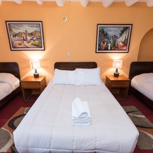 The Standard Triple Room with Garden View at the Hotel Sol