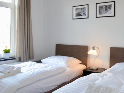 Luxurious hotel beds with first class linen
