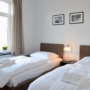 Luxurious hotel beds with first class linen