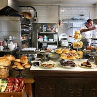 A wide selection of deserts and breads on our counter, all made on site by our baker Mark