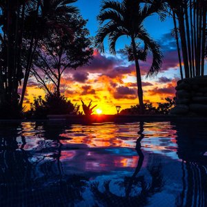 Experience the stunning sunsets from the pool