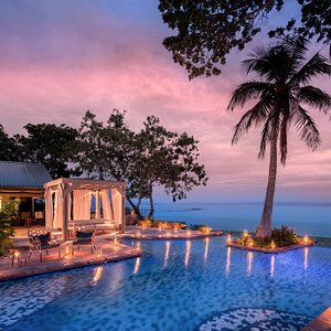 Sunset over the iconic infinity pool and paradise beyone