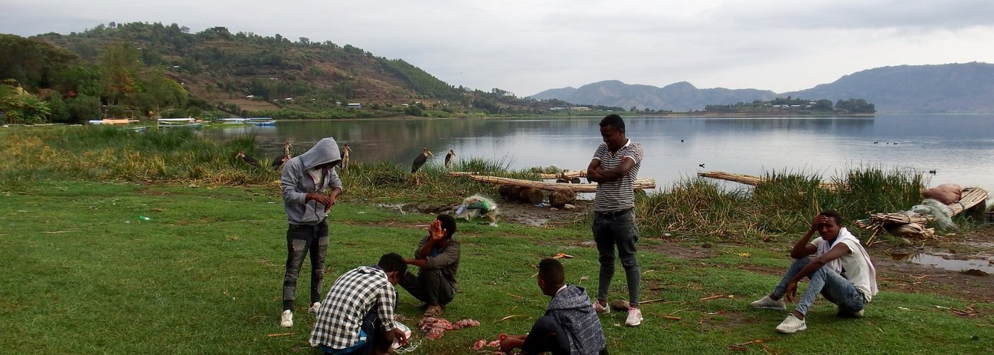 Fisherman gutting their catch before sale