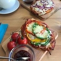 Homemade flatbreads served with onion chutney and vine tomatoes