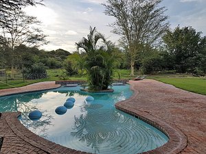 Uris Safari Lodge in Etosha National Park, image may contain: Pool, Water, Backyard, Swimming Pool
