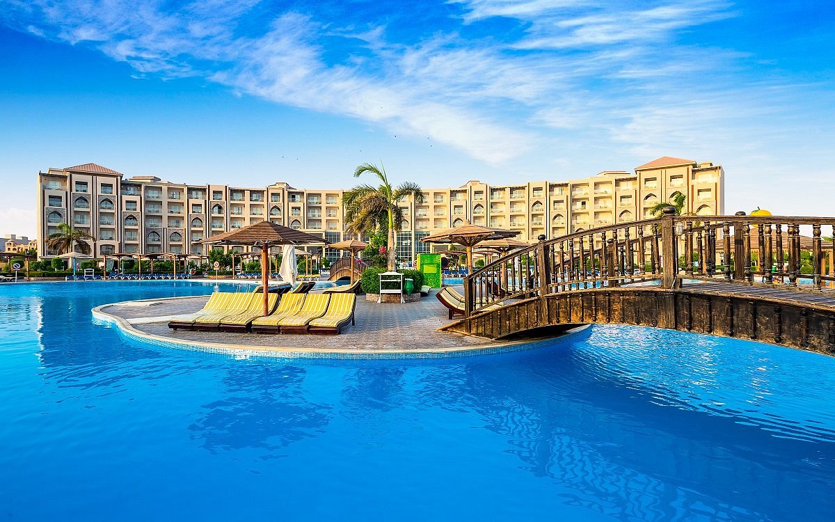 Hawaii paradise aqua park resort 5 отзывы. Гавайи Цезарь Палас. Bellagio Beach Resort Spa Хургада. Гаваи Цезарь дримс отель Гавайи. Гавайи Цезарь Палас отель фото.