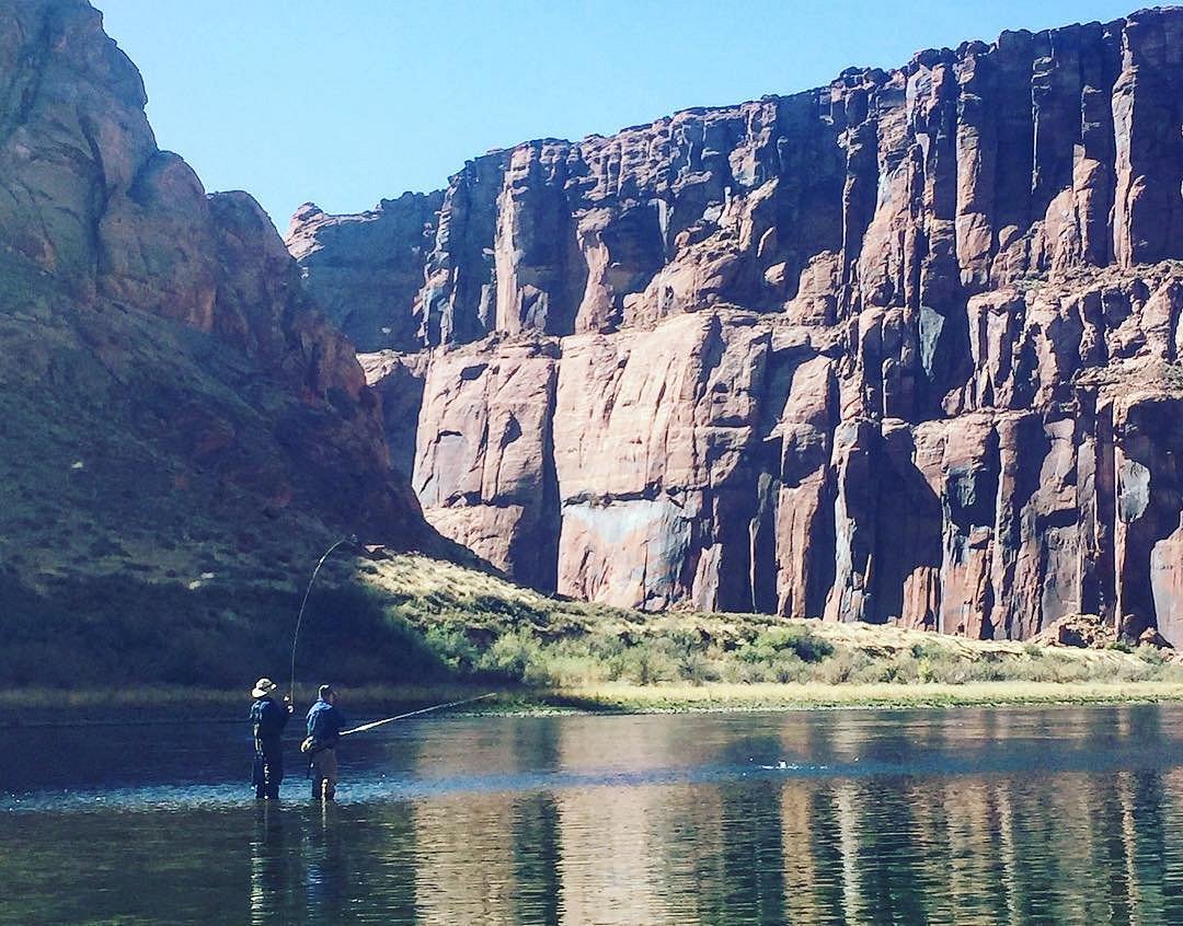 Fly-Fisher Casting On The Colorado River At Lees Ferry, Arizona