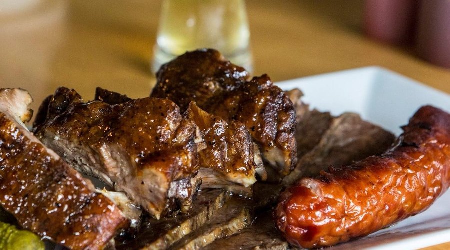 Redneck BBQ platter: baby back ribs, beef brisket, smoked sausage, all meats smoked on premises.